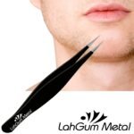Plucking hair on chin using fine pointed tweezers for precise grip and easy removal of stubborn hairs