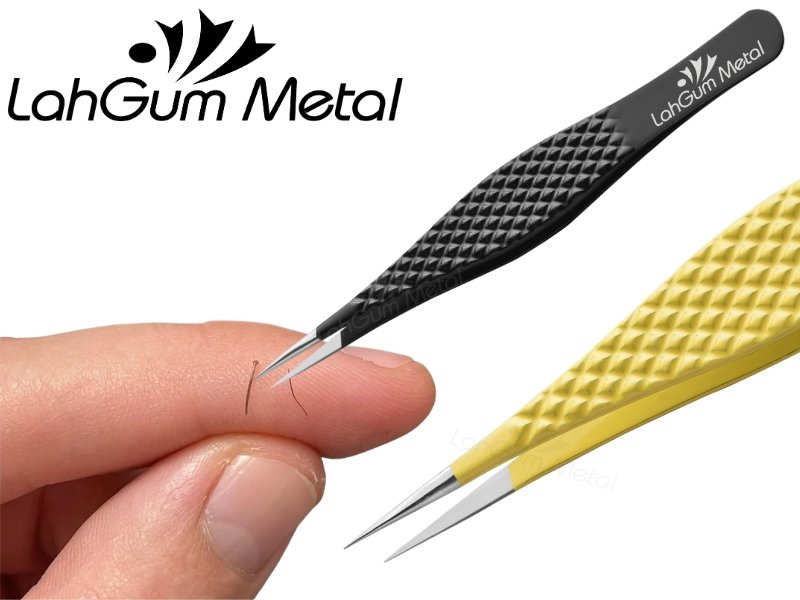 Tweezers removing splinter finger using ultra fine pointed tips for accurate grip and safe removal